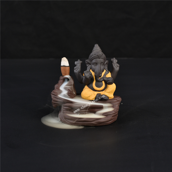 黄色のセラミックガネーシャセンスバーナー煙