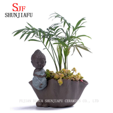 セラミックの家/庭のヴィンテージの植木鉢と小さな僧侶と仏